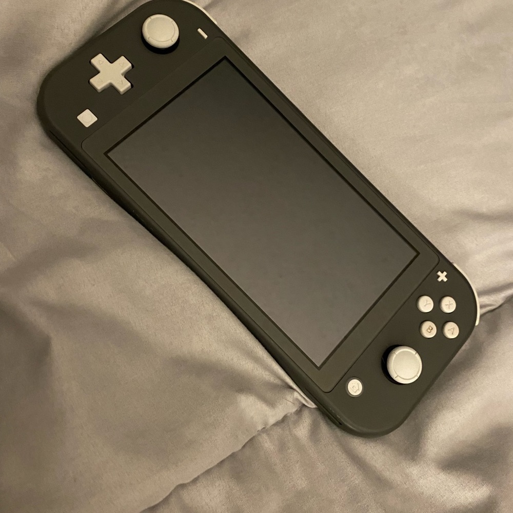 Nintendo Switch Lite. Like new condition. PRICE IS FIRM!!